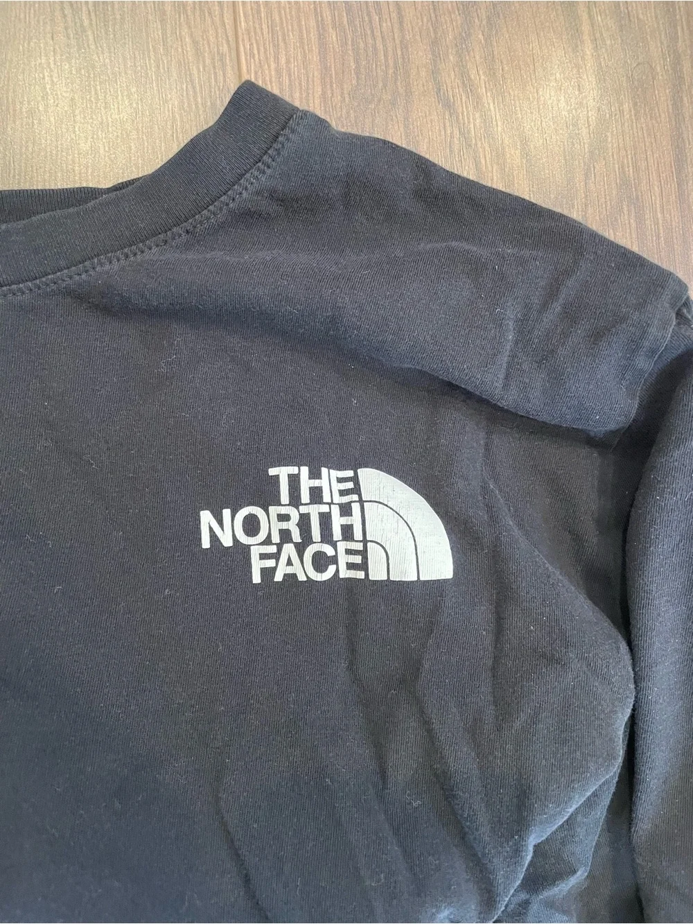 The North Face Black Graphic Tee - 'Never Stop Exploring'